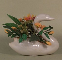 Bird of Paradise and Ferns in a Swan Container